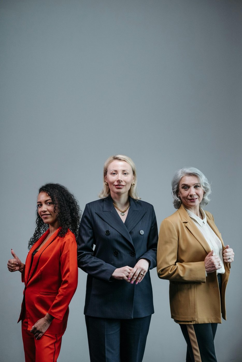 Three confident professional women standing together