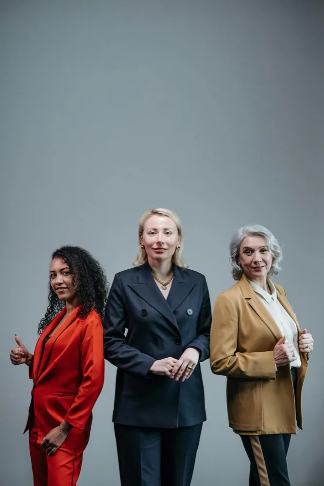 Three confident professional women standing together